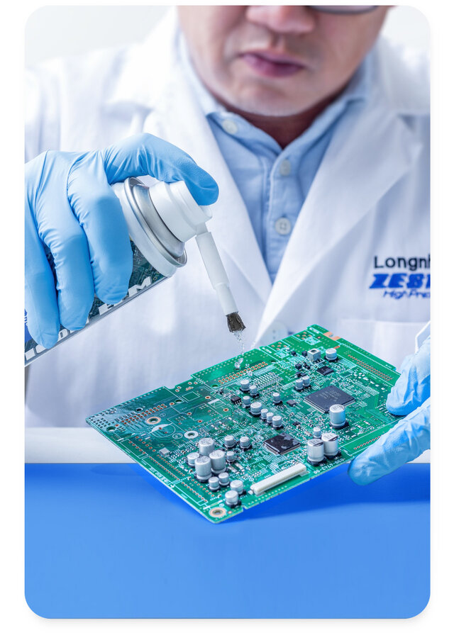 engineer using vigon efm aerosol to clean flux residue of pcb