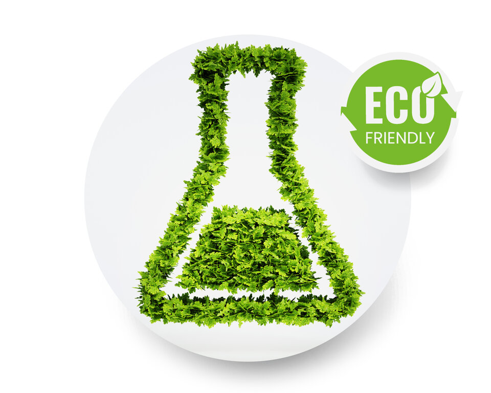 green beaker made out of eco friendly leaves